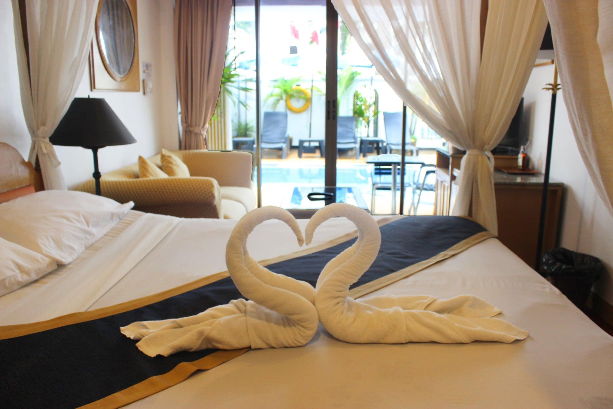 The Orchid Hotel Kalim Bay Patong Exterior photo